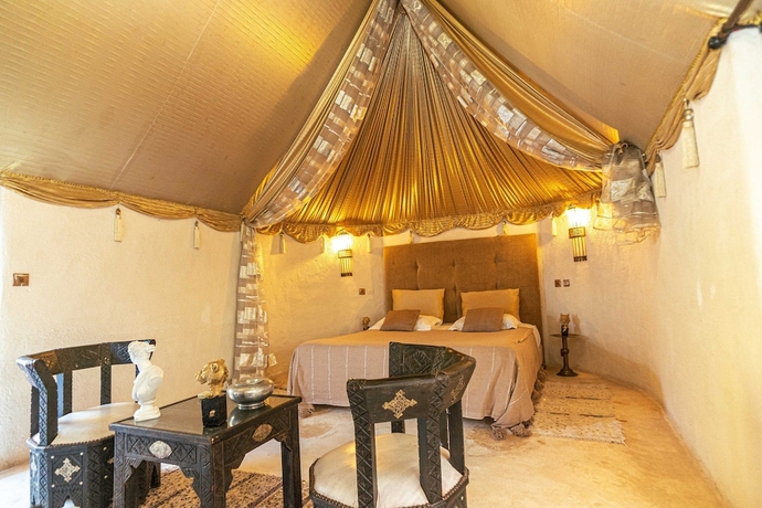 Imagen de la habitación del Hotel Les Jardins D\'Issil Maison d\'Hôtes. Foto 5