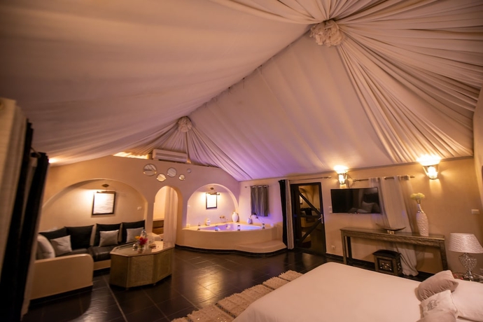 Imagen de la habitación del Hotel Les Jardins D\'Issil Maison d\'Hôtes. Foto 7