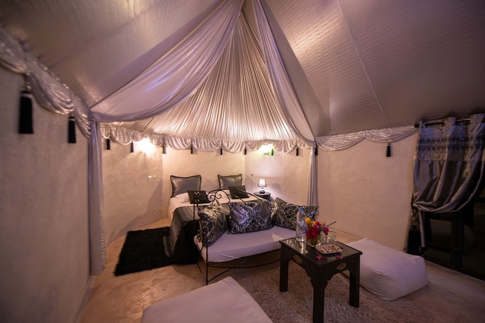 Imagen de la habitación del Hotel Les Jardins D\'Issil Maison d\'Hôtes. Foto 11