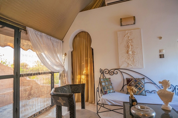 Imagen de la habitación del Hotel Les Jardins D\'Issil Maison d\'Hôtes. Foto 12