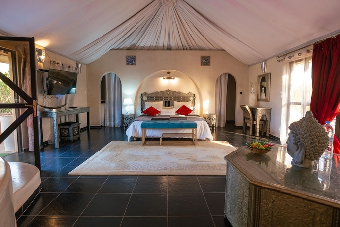 Imagen de la habitación del Hotel Les Jardins D\'Issil Maison d\'Hôtes. Foto 13