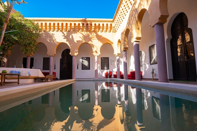 Imagen de la habitación del Hotel Les Jardins D\'Issil Maison d\'Hôtes. Foto 17