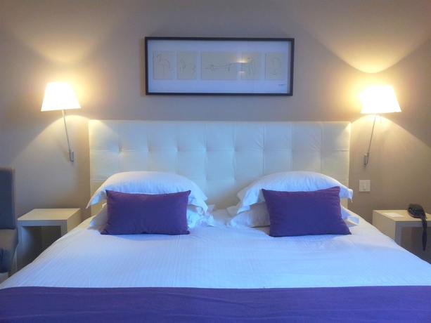 Imagen de la habitación del Hotel Les Jardins D'adalric. Foto 7