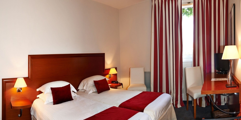 Imagen de la habitación del Hotel Les Jardins D'adalric. Foto 9