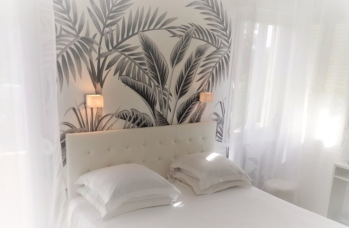 Imagen de la habitación del Hotel Les Jardins De Bormes. Foto 6