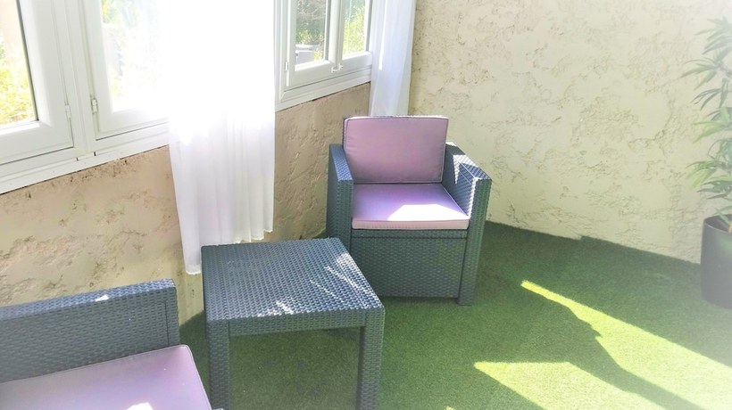 Imagen de la habitación del Hotel Les Jardins De Bormes. Foto 7