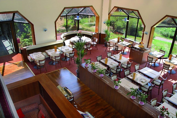 Imagen del bar/restaurante del Hotel Les Jardins De Deauville. Foto 1