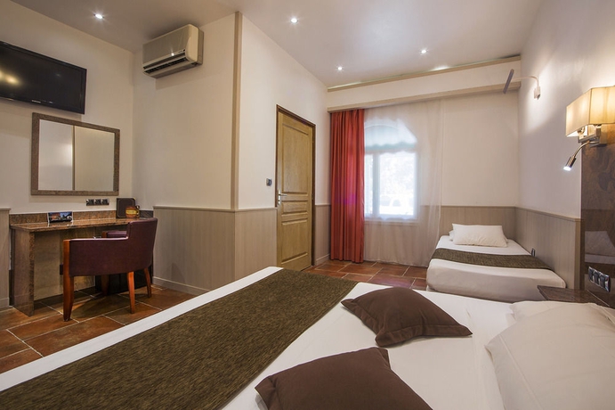 Imagen de la habitación del Hotel Les Jardins De La Glaciere. Foto 5