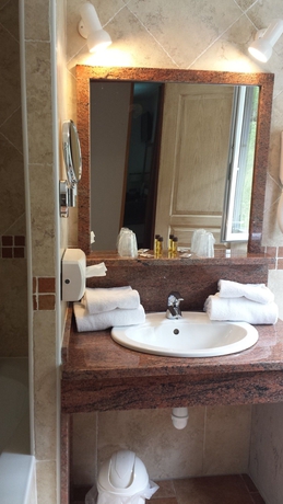 Imagen de la habitación del Hotel Les Jardins De La Glaciere. Foto 6