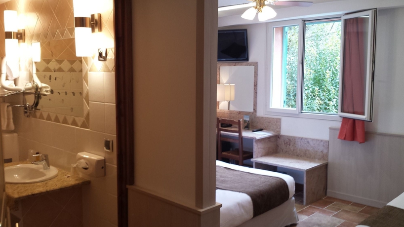 Imagen de la habitación del Hotel Les Jardins De La Glaciere. Foto 7