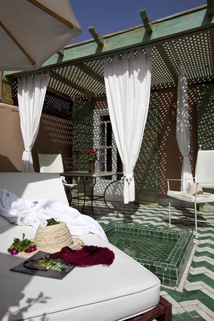 Imagen de la habitación del Hotel Les Jardins De La Medina. Foto 9