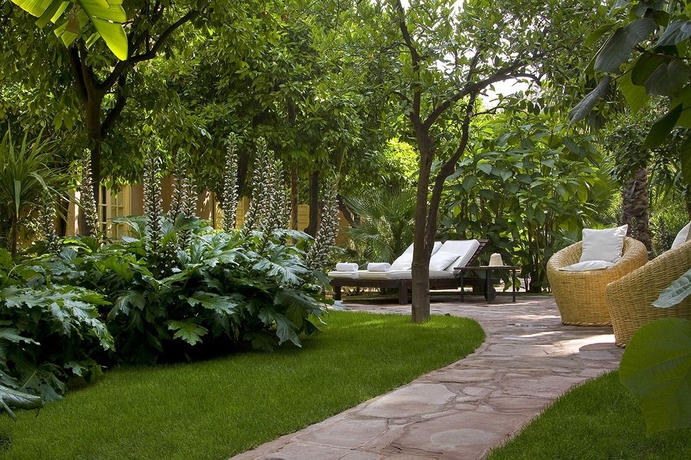 Imagen de la habitación del Hotel Les Jardins De La Medina. Foto 10