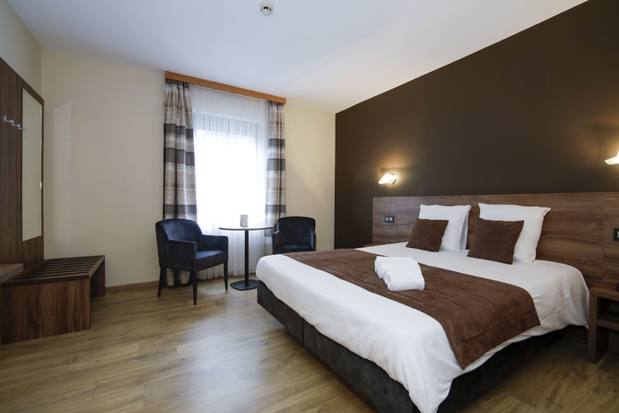 Imagen de la habitación del Hotel Les Jardins De La Molignée. Foto 9