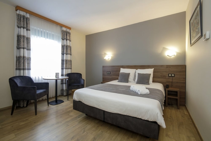 Imagen de la habitación del Hotel Les Jardins De La Molignée. Foto 11