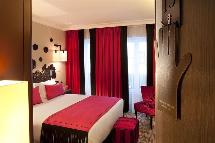 Imagen de la habitación del Hotel Les Jardins De La Villa Hotel. Foto 8