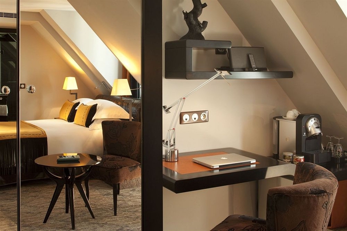 Imagen de la habitación del Hotel Les Jardins De La Villa Hotel. Foto 9