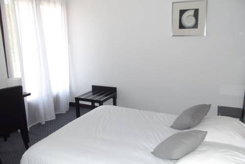Imagen de la habitación del Hotel Les Jardins De L'ocean. Foto 5