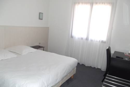 Imagen de la habitación del Hotel Les Jardins De L'ocean. Foto 8