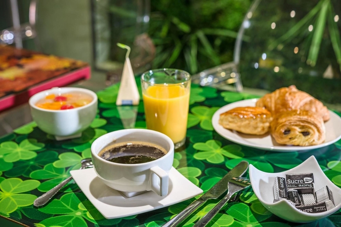 Imagen del bar/restaurante del Hotel Les Jardins De Montmartre. Foto 3