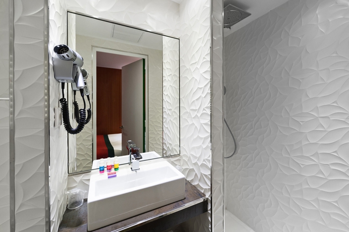 Imagen de la habitación del Hotel Les Jardins De Montmartre. Foto 7