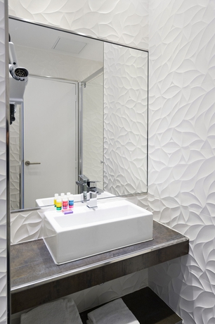 Imagen de la habitación del Hotel Les Jardins De Montmartre. Foto 8