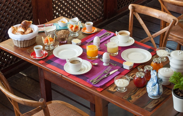 Imagen del bar/restaurante del Hotel Les Jardins De Rio Boutique. Foto 3