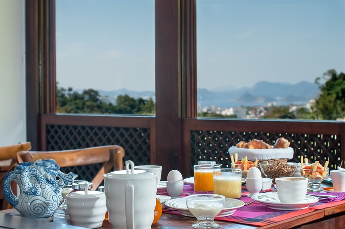 Imagen del bar/restaurante del Hotel Les Jardins De Rio Boutique. Foto 5