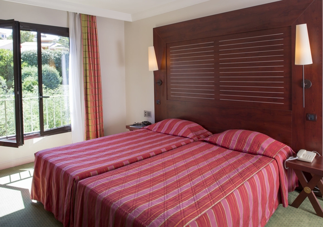 Imagen de la habitación del Hotel Les Jardins De Sainte Maxime. Foto 11