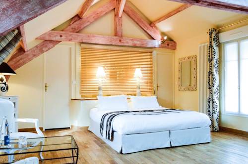 Imagen de la habitación del Hotel Les Jardins D'epicure. Foto 3