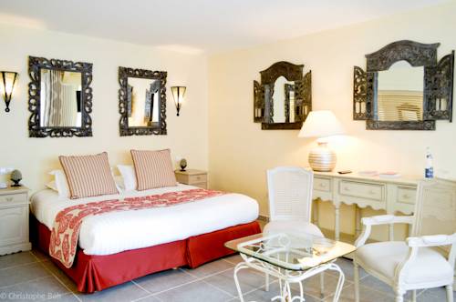 Imagen de la habitación del Hotel Les Jardins D'epicure. Foto 4