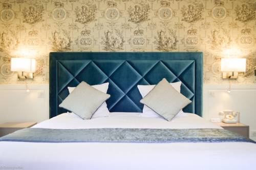 Imagen de la habitación del Hotel Les Jardins D'epicure. Foto 9