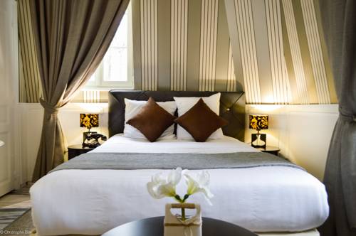 Imagen de la habitación del Hotel Les Jardins D'epicure. Foto 10