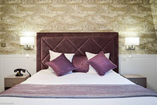 Imagen de la habitación del Hotel Les Jardins D'epicure. Foto 11