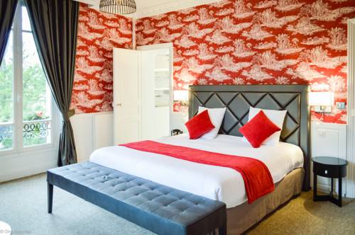 Imagen de la habitación del Hotel Les Jardins D'epicure. Foto 12