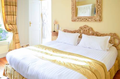 Imagen de la habitación del Hotel Les Jardins D'epicure. Foto 13