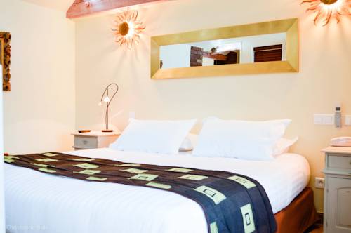 Imagen de la habitación del Hotel Les Jardins D'epicure. Foto 16