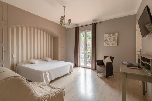 Imagen de la habitación del Hotel Les Jardins Du Cèdre. Foto 6