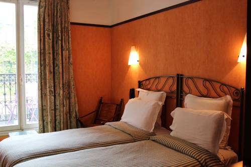 Imagen de la habitación del Hotel Les Jardins Du Luxembourg. Foto 3