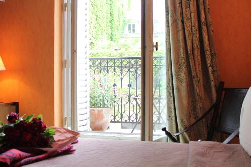 Imagen de la habitación del Hotel Les Jardins Du Luxembourg. Foto 4