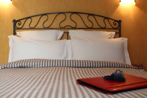 Imagen de la habitación del Hotel Les Jardins Du Luxembourg. Foto 7