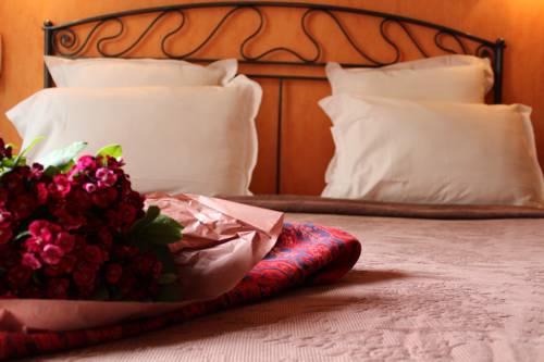 Imagen de la habitación del Hotel Les Jardins Du Luxembourg. Foto 8