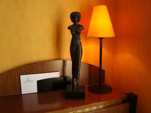 Imagen de la habitación del Hotel Les Jardins Du Luxembourg. Foto 9