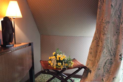 Imagen de la habitación del Hotel Les Jardins Du Luxembourg. Foto 14