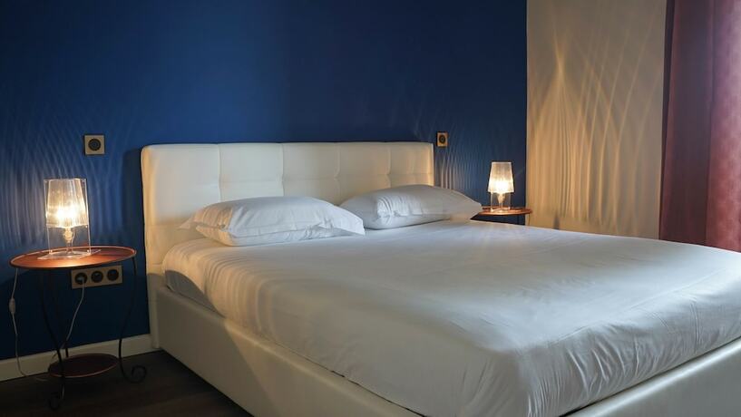 Imagen de la habitación del Hotel Les Jardins. Foto 18