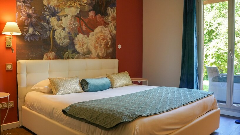 Imagen de la habitación del Hotel Les Jardins. Foto 20