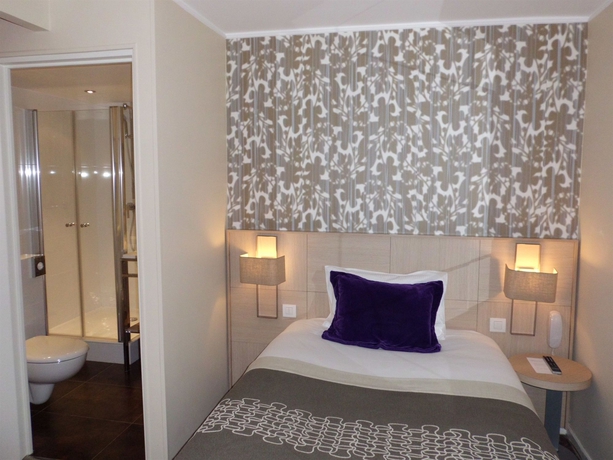 Imagen de la habitación del Hotel Les Jardins d'Eiffel. Foto 10