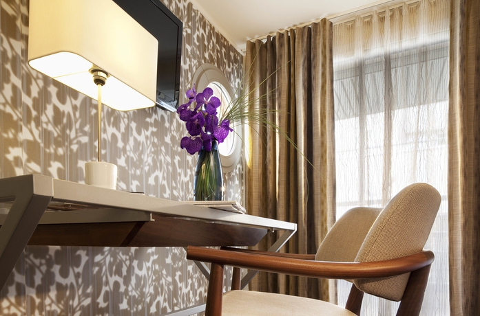 Imagen de la habitación del Hotel Les Jardins d'Eiffel. Foto 11