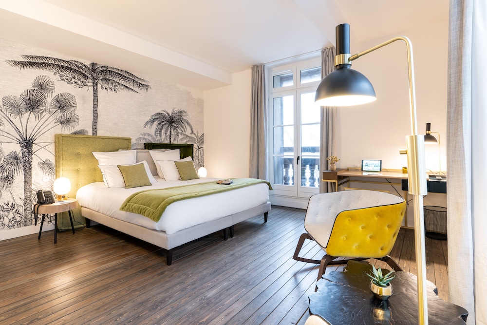 Imagen de la habitación del Hotel Les Jardins de Coppelia. Foto 2