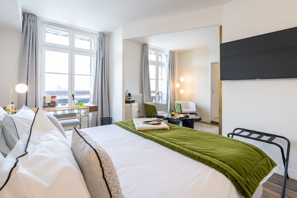 Imagen de la habitación del Hotel Les Jardins de Coppelia. Foto 11