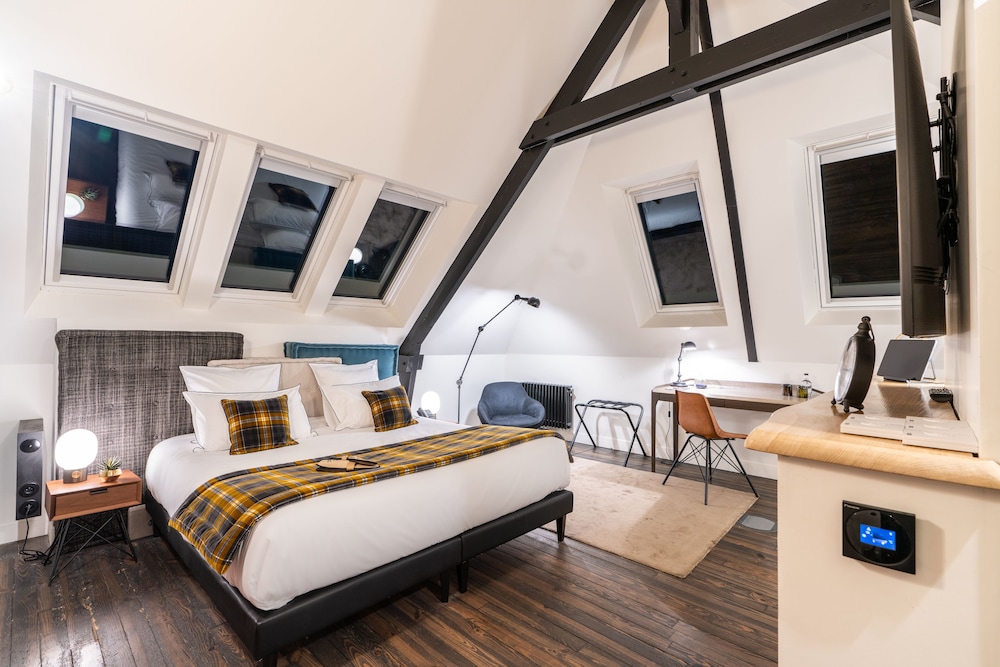 Imagen de la habitación del Hotel Les Jardins de Coppelia. Foto 14